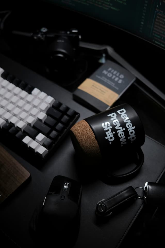 Vercel mug with computer peripherals